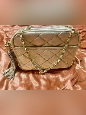 Paradox Leather Metallic Quilted Tassel Crossbody Bag